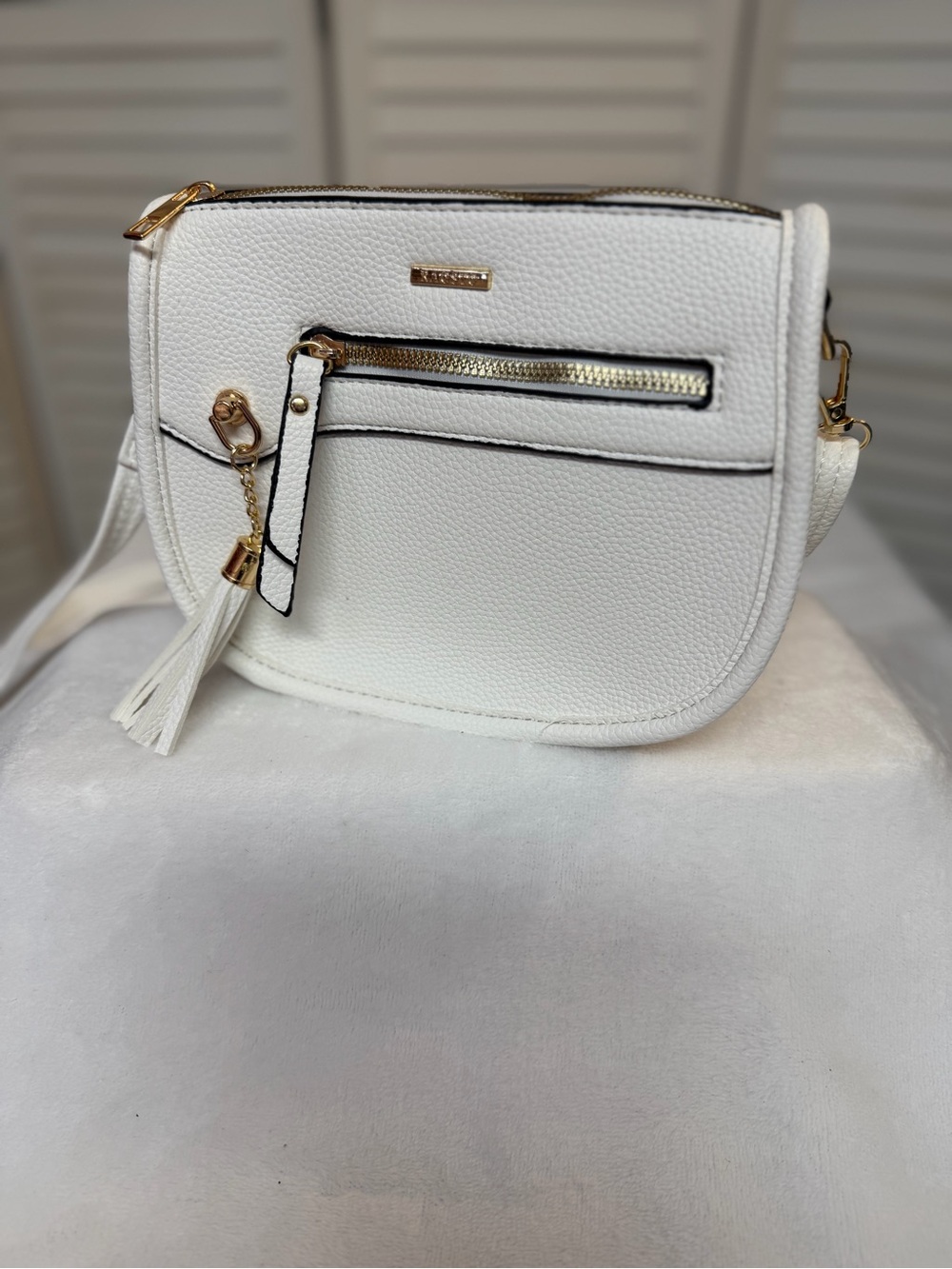NWOT White Saddle Crossbody Bag with Tassel and Gold Hardware